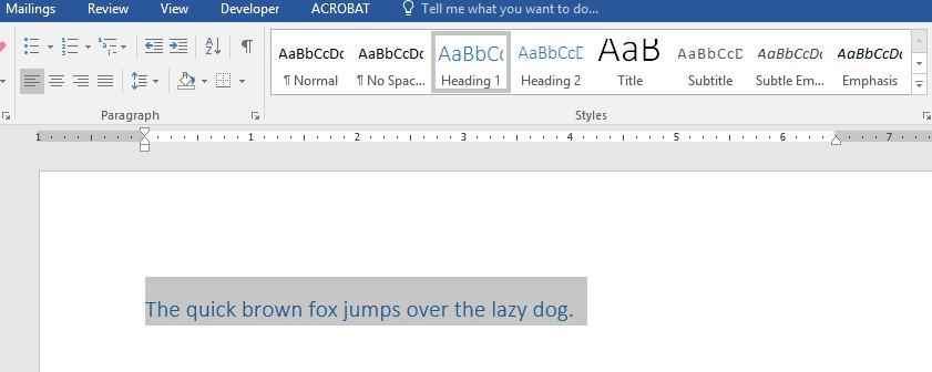Screenshot of Word document with text selected and Heading 1 selected from Styles Gallery.
